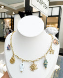 XPRESS seashell sun necklace